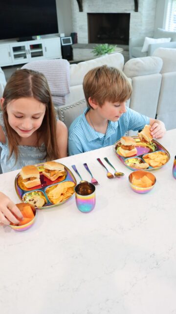 Easy summer lunches don’t have to be complicated ☀️

This lunch took just a few minutes to put together, but the real excitement came when the kids saw their new rainbow @ahimsahomeusa mindful mealtime sets 🌈 We loved our original stainless steel sets so much that I ordered four more, and they’ve quickly become a favorite around here.

I love that they’re durable, easy to clean, and designed to grow with our family. Sometimes the simplest swaps end up being the ones you appreciate the most. 🤍

What’s your go-to easy summer lunch for the kids?

#AhimsaHome #SummerLunchIdeas #MomLifeMadeSimple #KidsMealIdeas #FamilyLifestyle