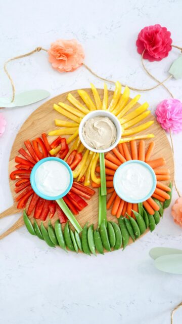Mother’s Day Flower Veggie Board 🌷

Stop scrolling—this is the cutest veggie tray you’ll make all spring 💗

This flower-inspired board is perfect for Mother’s Day brunch, picnics, or a simple way to make veggies fun + festive!

🌼 Petals: red & yellow bell peppers + carrots
🌿 Stems: celery�🌱 Grass: snap peas

Pair it with ranch, French onion dip, or hummus—whatever your crew loves!

SAVE this for your Mother’s Day menu💐

#MothersDayFood #VeggieBoard #CharcuterieBoard #EasyMothersDay #BrunchIdeas